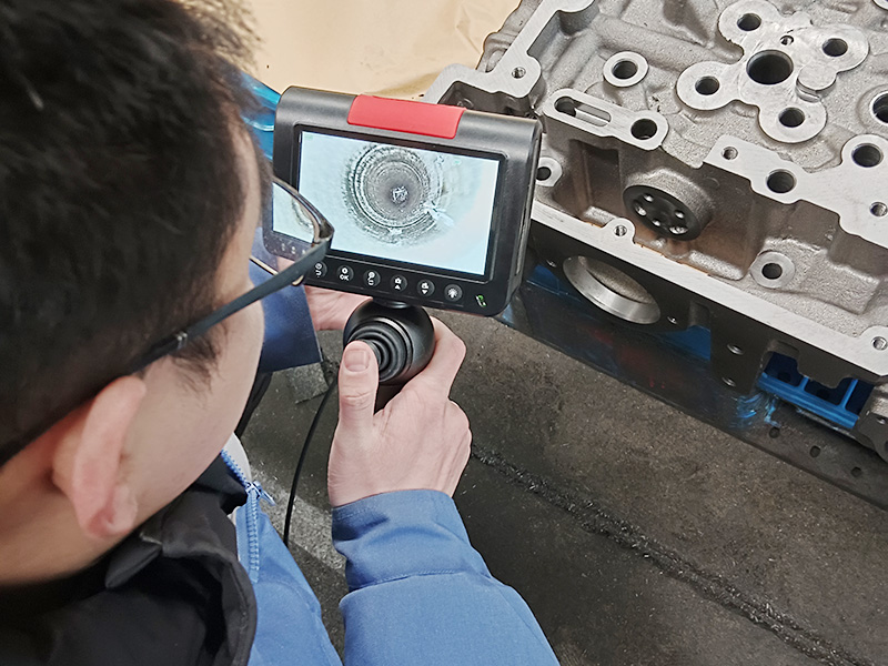Portable borescope inspection camera used for detailed internal machinery testing